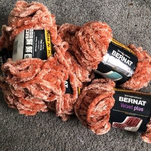 7 full rolls of bernat velvet plus yarn